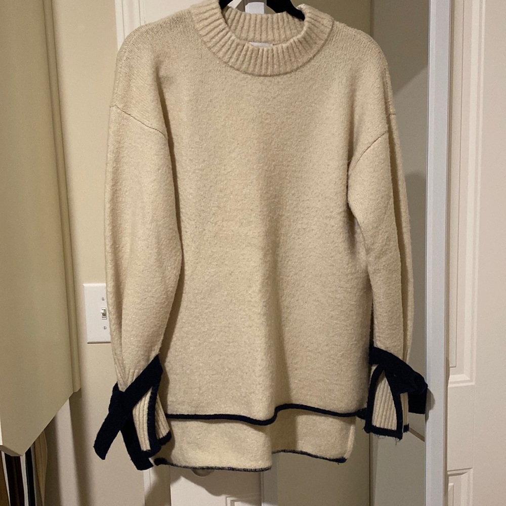 Cream and Navy sweater size large.